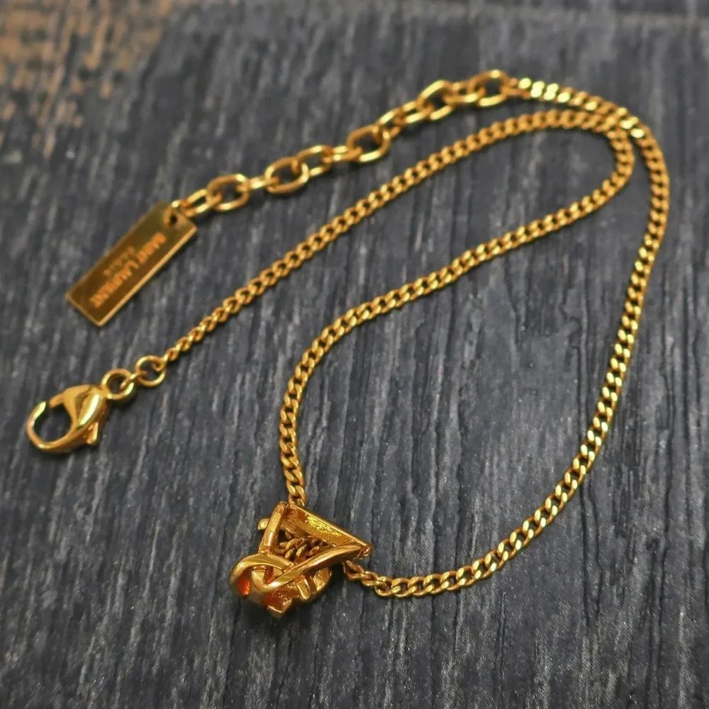 LOT 1080 18K gold plated YSL bracelet